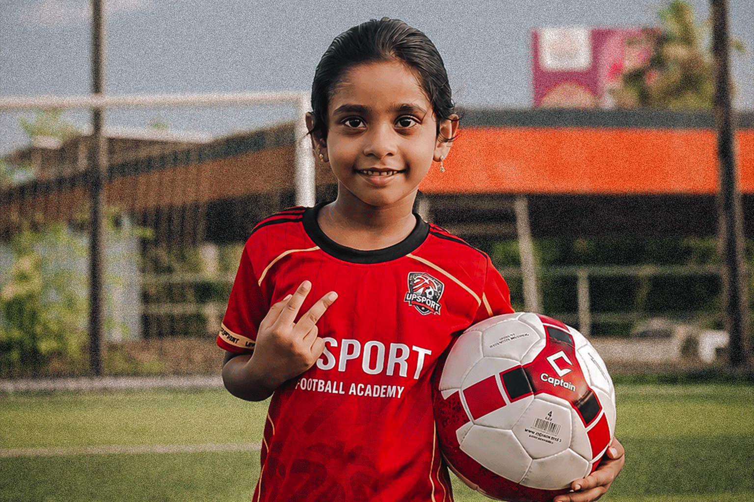 UPSPORT Football Academy youth players training on the pitch